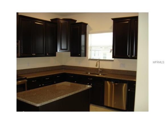 
Casa Nova - 4 dormitorios dentro condominio de Luxo - Davenport / Orlando $272,590 