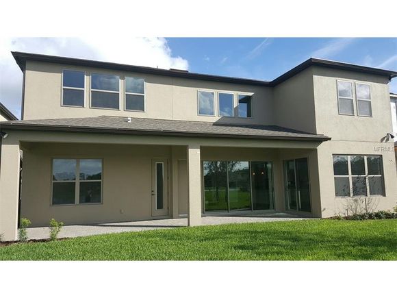Nova casa de luxo no Royal Legacy Estates com vista de lagoa - Windermere - Orlando - $616,175