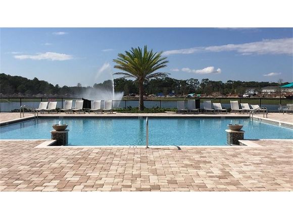 Nova casa de luxo no Royal Legacy Estates com vista de lagoa - Windermere - Orlando - $616,175